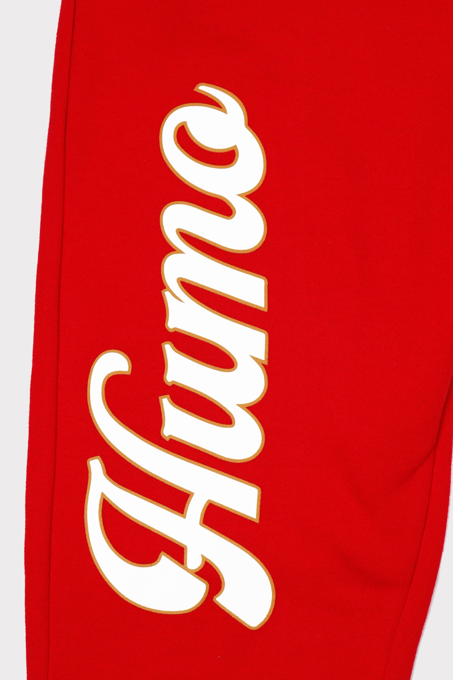 humo red joggers Humo logo close up